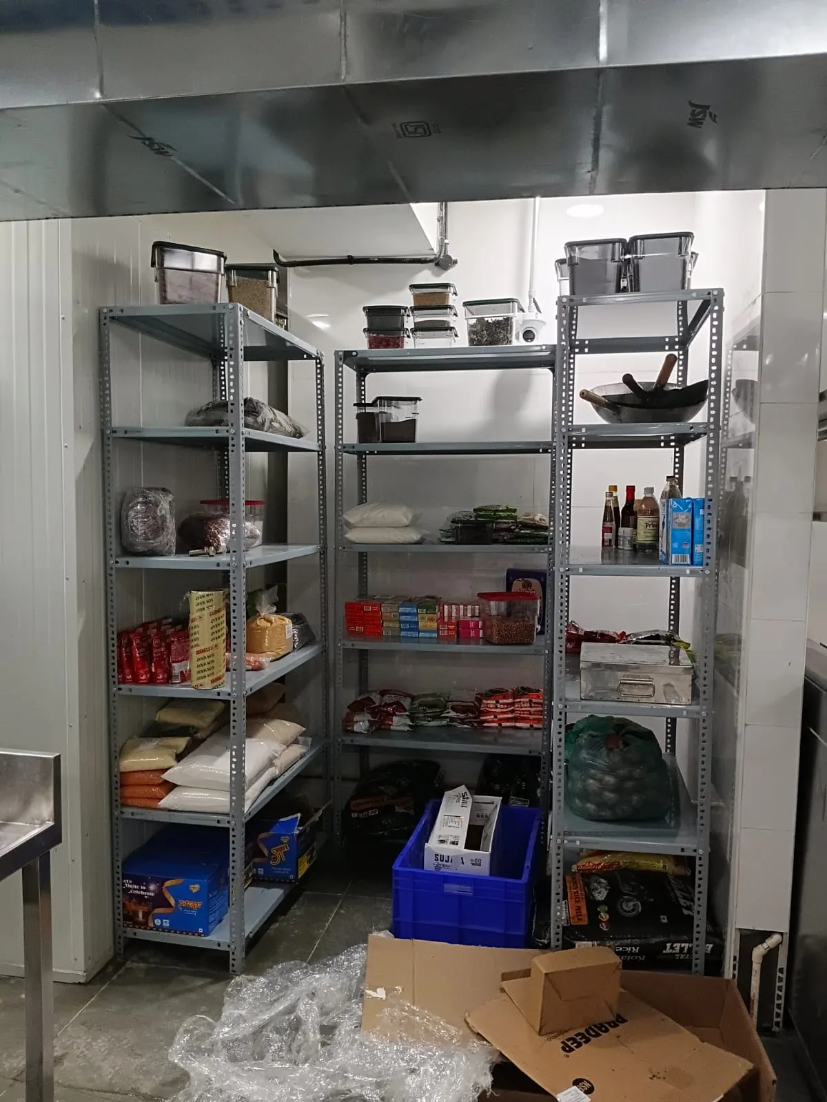 Storage racks in a commercial kitchen store room